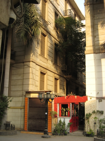 <a class="fancybox" rel="gallery-" href="https://www.passageways.clustermappinginitiative.org/sites/default/files/styles/largest/public/a5_2_0.jpg?itok=eWLhbbwg" title="The entrance to Al-Subki Passageway is through a flower kiosk.">Enlarge</a><br >2015, Oct 18, 03:10pm<br>The entrance to Al-Subki Passageway is through a flower kiosk.