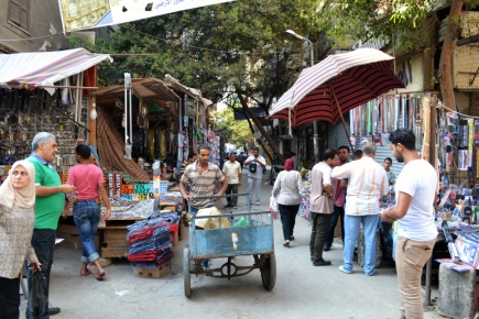 <a class="fancybox" rel="gallery-" href="https://www.passageways.clustermappinginitiative.org/sites/default/files/styles/largest/public/dsc_0178_0.jpg?itok=bdaP5qte" title="A view of the activities in Tawfiqiya market in the afternoon.">Enlarge</a><br >2015, Oct 11<br>A view of the activities in Tawfiqiya market in the afternoon.