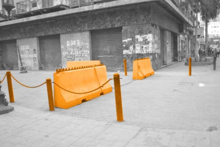 <a class="fancybox" rel="gallery-encroachments-and-territory-markers" href="https://www.passageways.clustermappinginitiative.org/sites/default/files/styles/largest/public/encroachment_and_territory_marker_yt_01.jpg?itok=YfG9_RA4" title="Concrete blocks and metal posts used to define territory around ...">Enlarge</a><br >Concrete blocks and metal posts used to define territory around ...