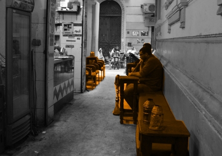 <a class="fancybox" rel="gallery-encroachments-and-territory-markers" href="https://www.passageways.clustermappinginitiative.org/sites/default/files/styles/largest/public/encroachments_1.jpg?itok=C4PcrJOZ" title="The wider part of the passage includes a coffee shop which extends its seating and takes up a portion of the width of the passage.">Enlarge</a><br >The wider part of the passage includes a coffee shop which extends its seating and takes up a portion of the width of the passage.